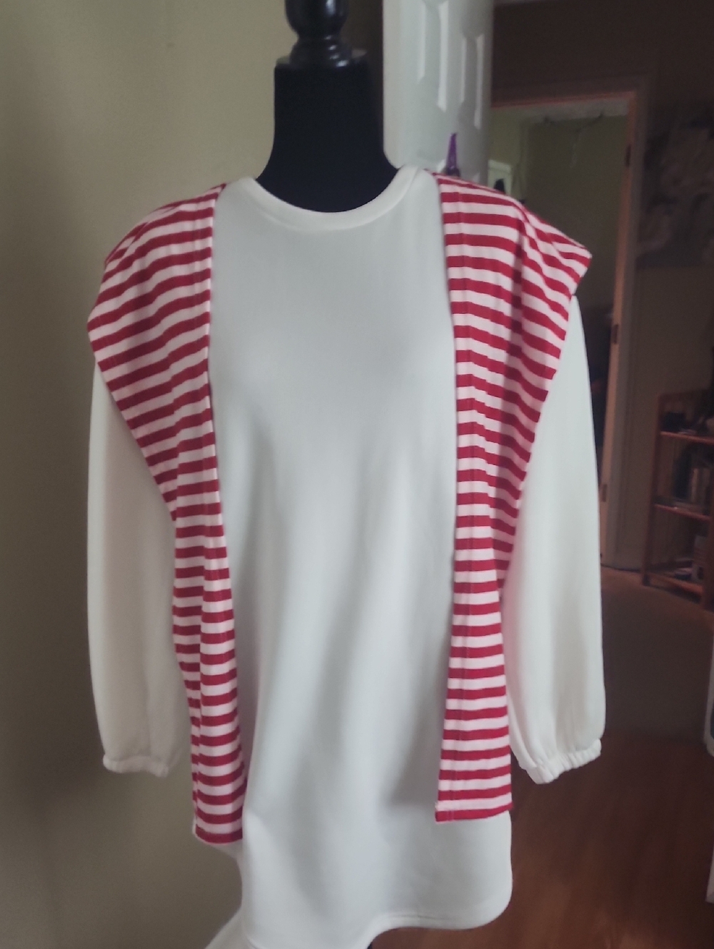Cream Long-Sleeve Top with Red Striped Vest Overlay